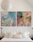Modern bedroom with abstract art on the wall and minimal decor.