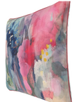 A digital mockup of a custom square throw pillow with an abstract watercolor design in pink, blue, and white, shown on a white interface screen with customization options on the right.