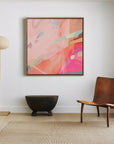 hot pink and blush large canvas art on wall, framed in oak