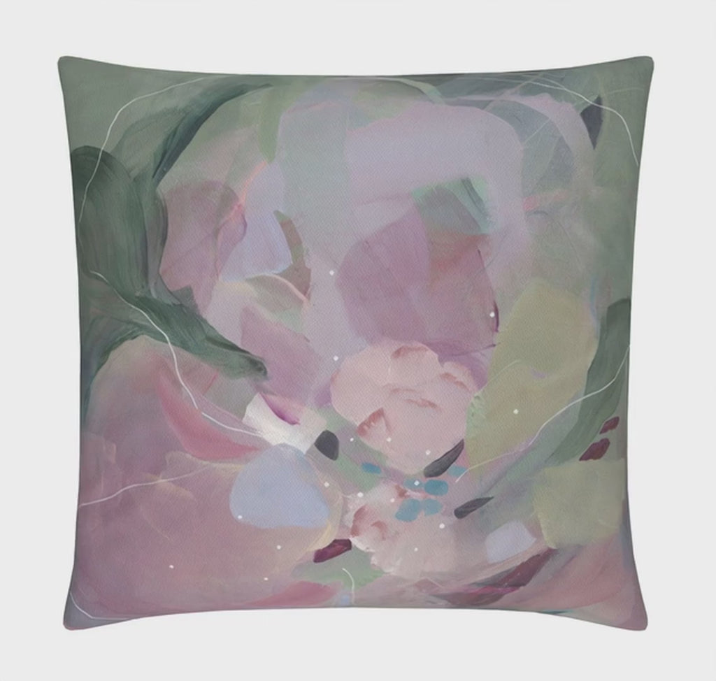 video of pink lilac cushion on sofa